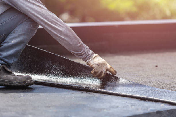 Professional Basement Waterproofing technician working in Mentone, IN